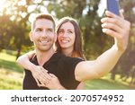 young happy millennial couple... | Shutterstock . vector #2070574952