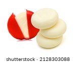 Small photo of Babybel cheese in red wex isolated on white background