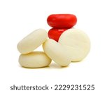 Small photo of Babybel cheese in red wex isolated on white background